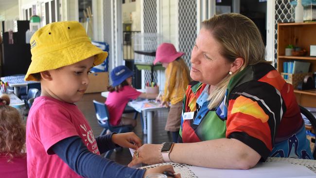 Aja-Pearl Latu, 4, with C&amp;K Eimeo Road Community Kindergarten director and teacher Belinda Rule. Picture: Heidi Petith