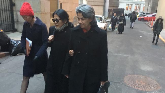 Sheri Yan walks with lawyer Isabelle Kirshner and an identified woman in New York in 2016. Picture: REUTERS/Nate Raymond