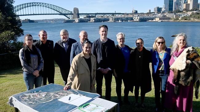 NSW Premier Chris Minns is joined by members of the Me-Mel (formerly Goat Island) Transfer Committee. Picture: NCA NewsWire / Jeremy Piper