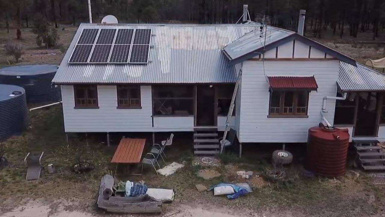 Furniture remains strewn around the Wieambilla property. Photo: Liam Kidston