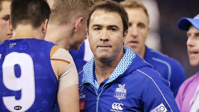 MELBOURNE, AUSTRALIA - MAY 12: Kangaroos head coach Brad Scott walks off after speaking at at three quarter time during the round eight AFL match between the North Melbourne Kangaroos and the Geelong Cats at Marvel Stadium on May 12, 2019 in Melbourne, Australia. (Photo by Michael Dodge/Getty Images)