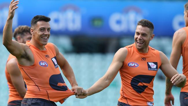 Dylan Shiel and Josh Kelly share a laugh at GWS training.