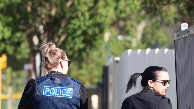 Police investigators door knocking after three gunshots were allegedly fired at a property. Picture: Russell Millard Photography