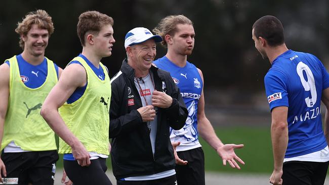 David Noble shares a laugh with players at training on Thursday. Picture: Michael Klein