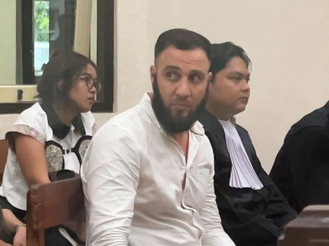 Aussie man Ali Shahrouk, 38, has been charged with assaulting a German woman at luxury Bali resort.