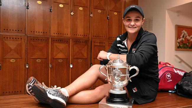 Ash Barty, with winner&#39;s trophy in her grasp, reflects on her French Open success at Goland Garros. Picture: Pool