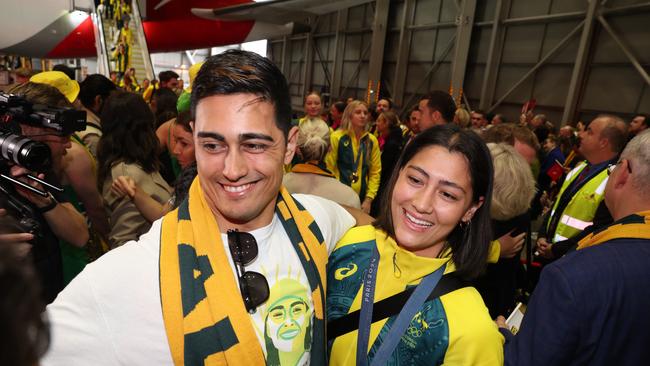 Saya Sakakibara meets family and friends including brother Kai. Picture: Rohan Kelly