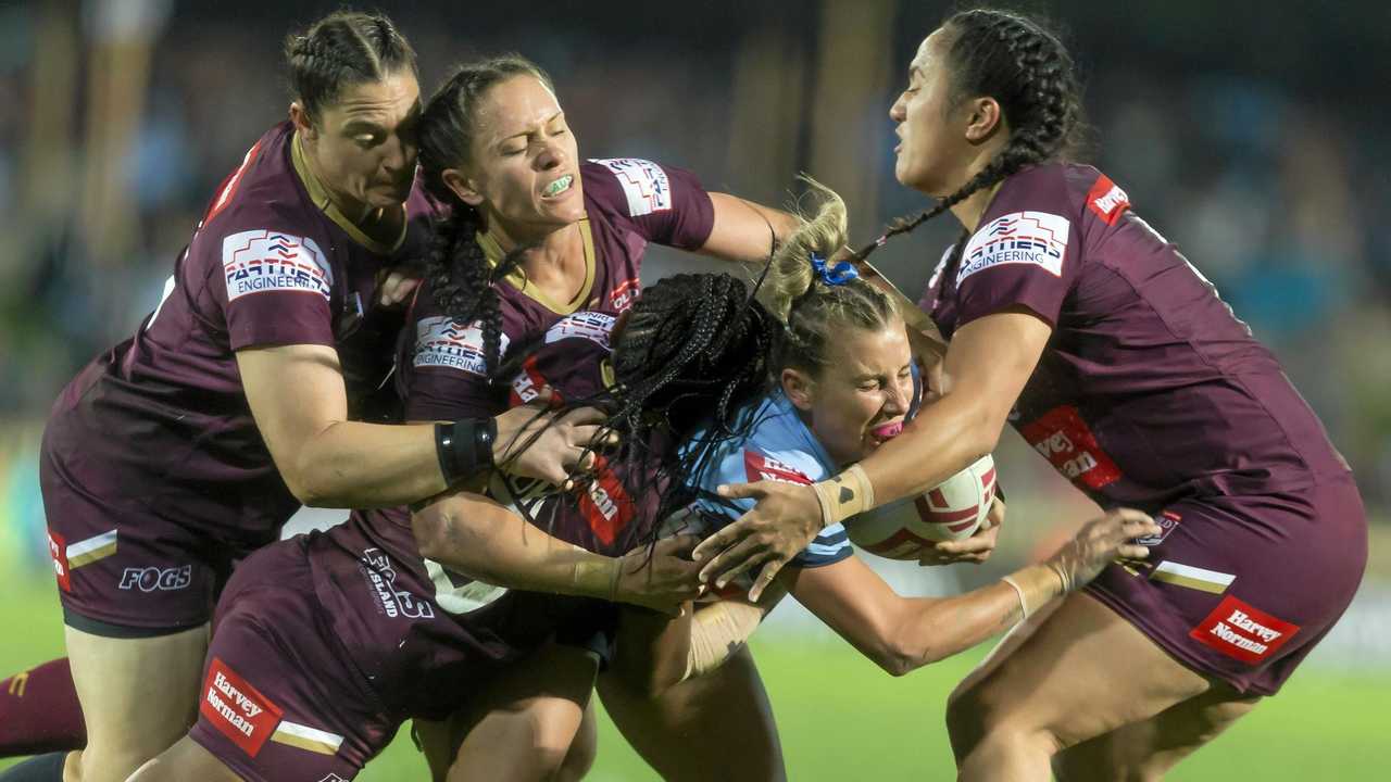 Sam Bremner of the Blues is tackled during the Women's State of Origin match between the NSW Blues and Queensland Maroons at North Sydney Oval in Sydney, Friday, June 22, 2018. (AAP Image/Craig Golding) NO ARCHIVING, EDITORIAL USE ONLY. Picture: CRAIG GOLDING