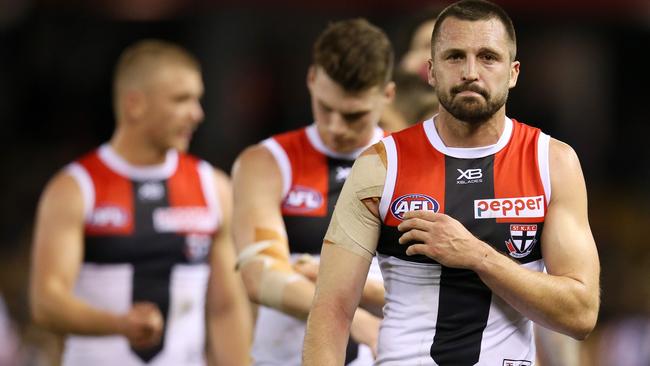 St Kilda's Jarryn Geary leads the Saints off Etihad Stadium. Pic: Michael Klein