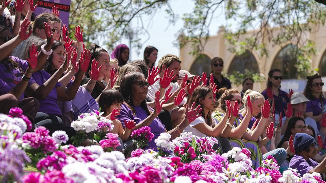 The 200-strong crowd outside Alice Springs Court House joined a Territory-wide day of action in Tuesday calling for domestic violence funding reform.