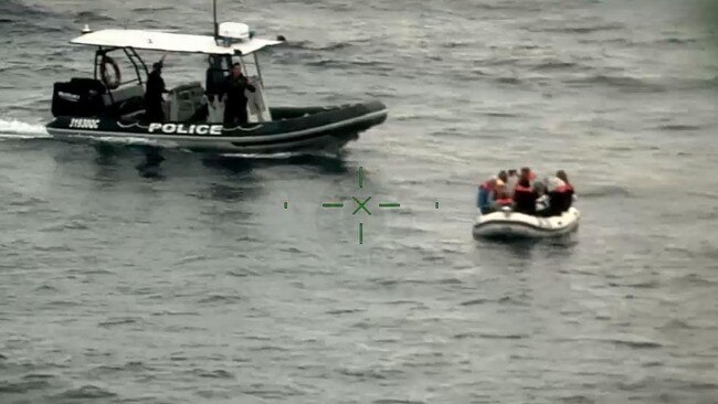 A police boat helped them back to shore. Picture: QPS