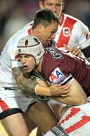 <p>NRL round 13 Sea Eagles v Dragons: Jamie Buhrer tackled by Nathan Fien and Beau Scott. Picture: Mark Evans</p>