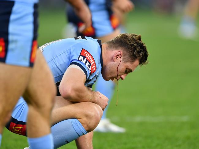 Cameron Murray was left bleeding after a high shot by Queensland’s Murray Taulagi. Picture: NRL Photos/Gregg Porteous