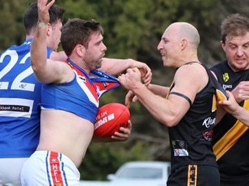 Onkaparinga Valley's Tim Webber and Lobethal's Luke Nitschke clash during the Hills Football League match at Lobethal on Saturday, July 4 2020. Picture: Aliza Fuller/Lobethal Football Club