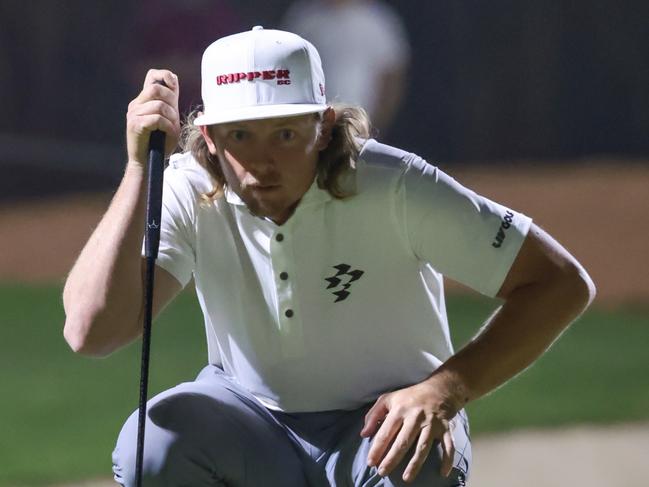 RIYADH, SAUDI ARABIA - FEBRUARY 6: Cameron Smith of team Ripper GC reads the green on the 5th hole during day one of LIV Golf Riyadh at Riyadh Golf Club on February 6, 2025 in Riyadh, Saudi Arabia. (Photo by Abdullah Ahmed/Getty Images)