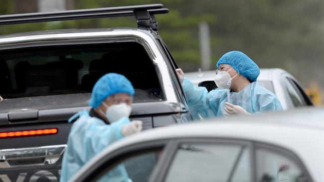 Northern Beaches residents attend a drive thru pop up COVID testing clinic at Newport Beach. Picture: Jeremy Piper