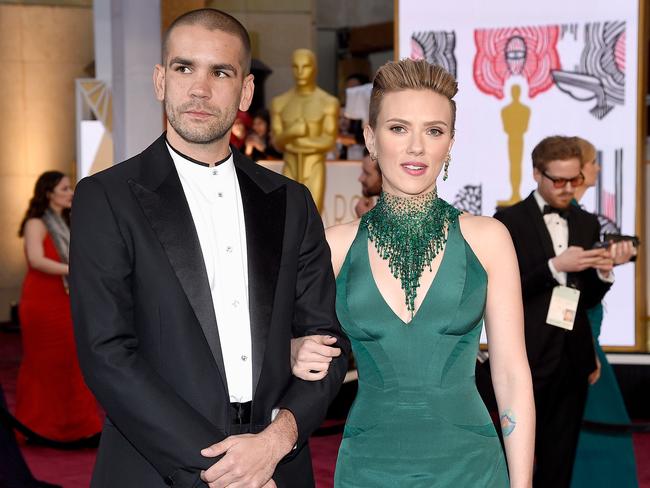 Scarlett Johansson and Romain Dauriac attend the Oscars 2015 red carpet. Picture: Getty