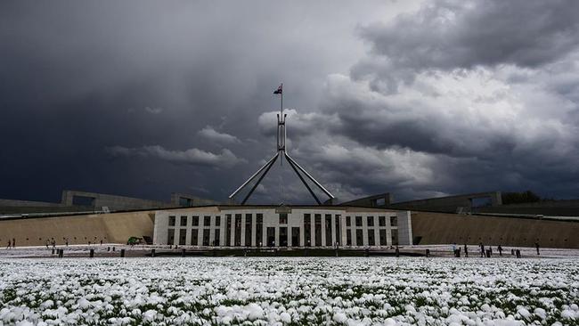 The lawn outside Parliament House has been pelted by hail. Picture: Instagram