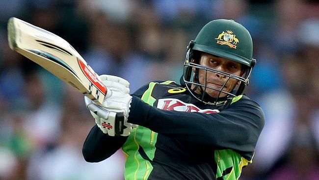 Australia's Usman Khawaja hits a boundary during the T20 international between Australia and India at the SCG .Picture Gregg Porteous