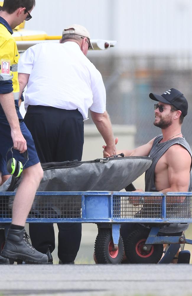 Chris Hemsworth thanks his pilot after arrival. Picture: Mark Brake