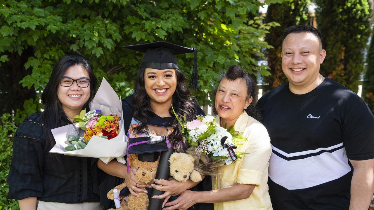 Bachelor of Paramedicine graduate Katherine Rivera with family (from left) Ellie Le, Sonia Rivera and Christian Rivera at the UniSQ graduation ceremony at Empire Theatres, Wednesday, December 14, 2022.