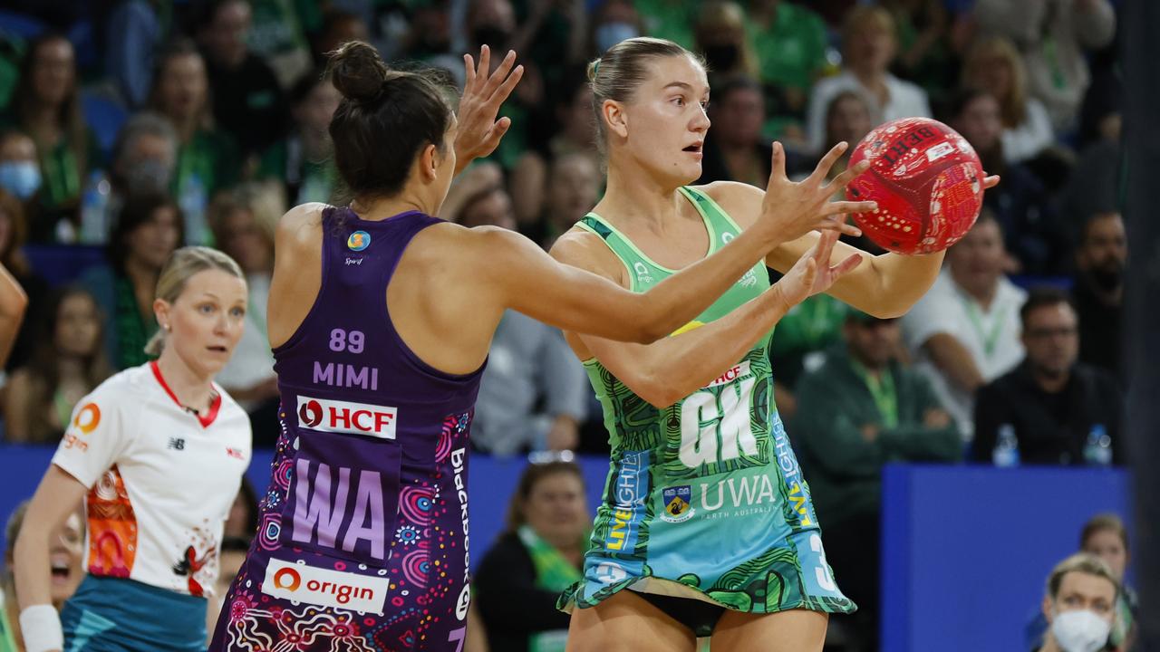 PERTH, AUSTRALIA – MAY 28: Courtney Bruce of the Fever passes the ball away during the round 12 Super Netball match between West Coast Fever and Queensland Firebirds at RAC Arena, on May 28, 2022, in Perth, Australia. (Photo by James Worsfold/Getty Images)