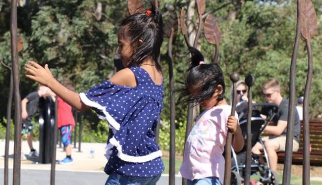 Children enjoy climbing in the public art installation at Hilltop Park, at Emerald Hills. Picture: Facebook