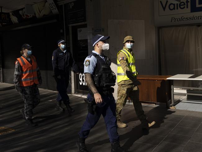 ADF and police in the Bankstown CBD on Saturday as authorities declare the region the new epicentre of NSW’s current outbreak. Picture: Getty