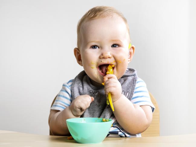 Infants first foods should included veggies.8-month-old Tommy Page loves his pureed food.Picture: NIGEL HALLETT