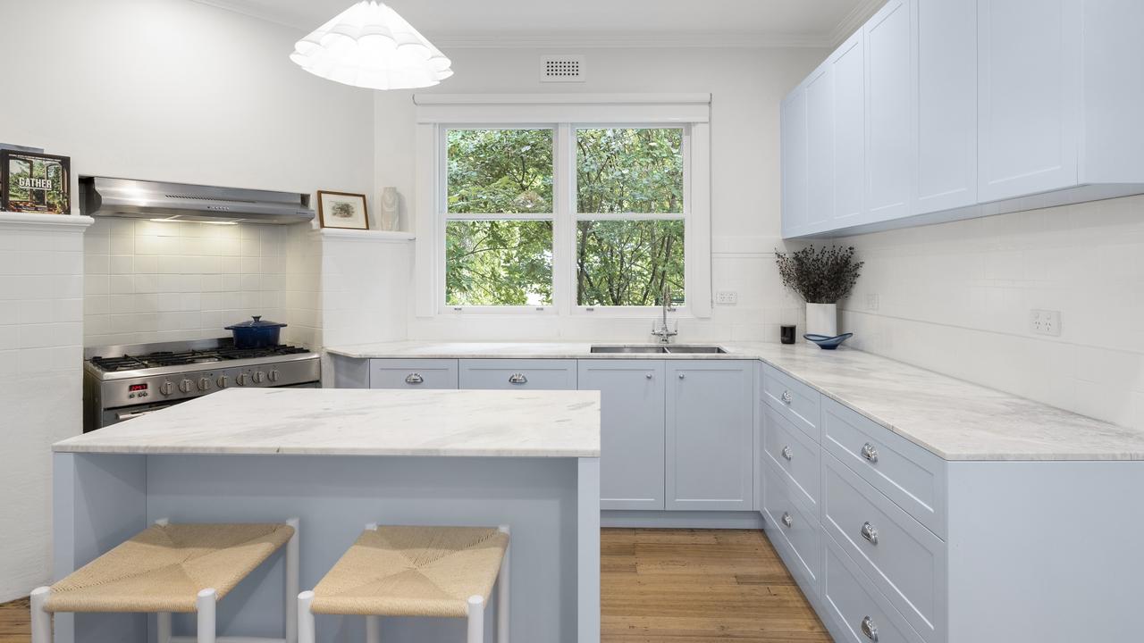 There’s French blue cabinetry and Perrin &amp; Rowe tapware in the kitchen.