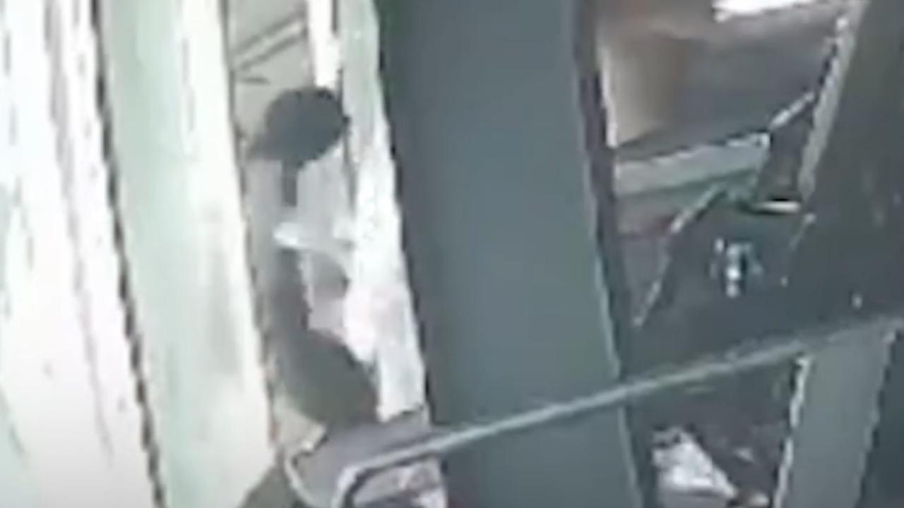 The moment a woman fell out a window at a gym in Indonesia. Picture: Newsflash