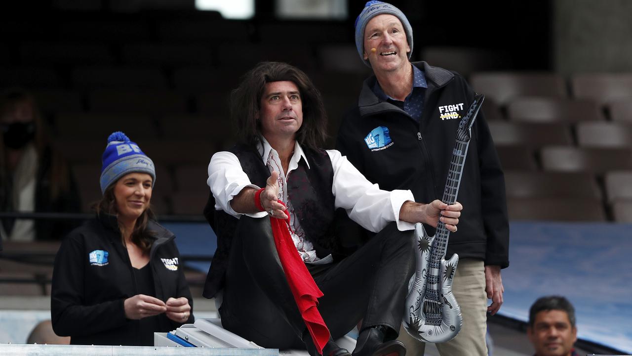 Gillon McLachlan gestures to Neale Daniher as he prepares to take the plunge. Picture: Dylan Burns/AFL Photos