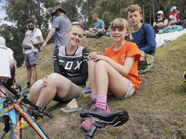 Locals Anna Johnston with Lucie, 9, and Oliver at the Picnic near the proposed cable car boarding station site. Picture: MATHEW FARRELL