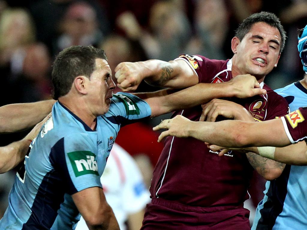 Greg Bird (L) and Corey Parker exchange punches during an Origin match.