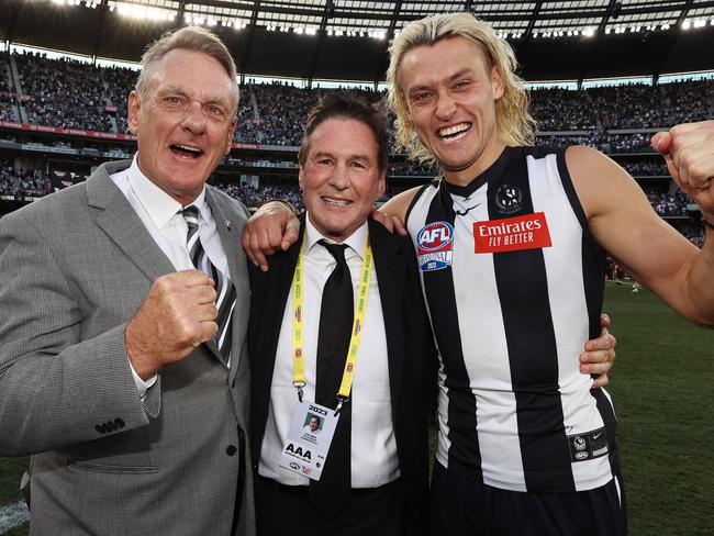 MELBOURNE , AUSTRALIA. September 30, 2023. AFL Grand Final between Collingwood and the Brisbane Lions at the MCG.  President Jeff Browne with Darcy and Pete Moore   .Picture by Michael Klein