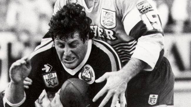 File/Pic 09 May 1988.  Gold Coast Tweed Giants vs  Broncos. Chris Close is tackled by Greg Conescu as Keith Gee goes over the top at Seagulls Stadium. headshot sport rugby league NSW action 35/A/7384 FRAME 1