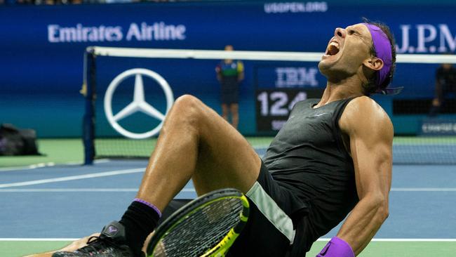 Rafael Nadal of Spain celebrates his victory over Daniil Medvedev of Russia during the men's Singles Finals match at the 2019 US Open at the USTA Billie Jean King National Tennis Center in New York on September 8, 2019. (Photo by Don Emmert / AFP)