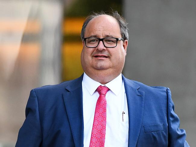 Clive Mensink, the nephew of Clive Palmer, leaves the Supreme Court in Brisbane, Wednesday, April 20, 2016. Mr Mensink Mr Mensink has asked the court to issue an injunction preventing the Queensland Nickel administrators from appointing receivers to three other Palmer nickel companies who were in a joint venture with QN. (AAP Image/Dave Hunt) NO ARCHIVING