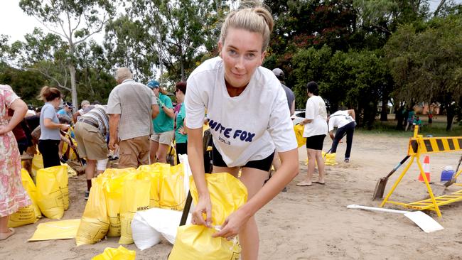 Alisha Proud from Newport, but protecting her parents home in Scarborough, at the Margate Sand Bag Depot, people prepping businesses, cafes and houses ahead of Cyclone Alfred, on the Redcliffe peninsular - on Tuesday 4th March 2025 - Photo Steve Pohlner