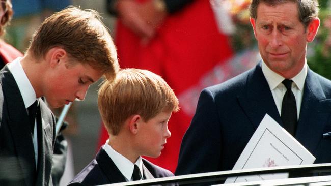 At his mother’s funeral in 1997.