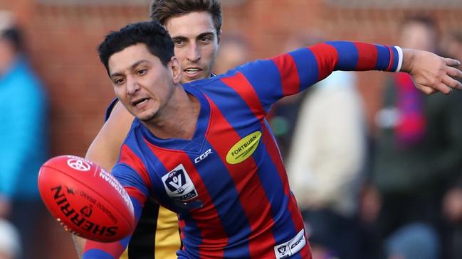 Robin Nahas gathers possession for VFL club Port Melbourne. Picture: Mark Dadswell