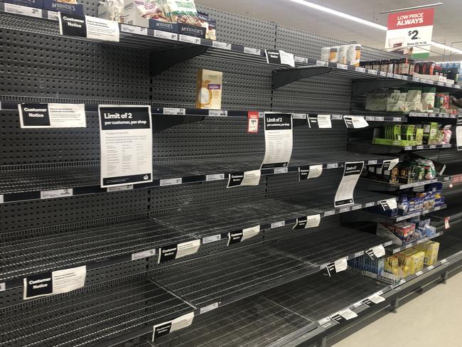 Empty shelves in the baking aisle at the Gladstone Valley Woolworths.