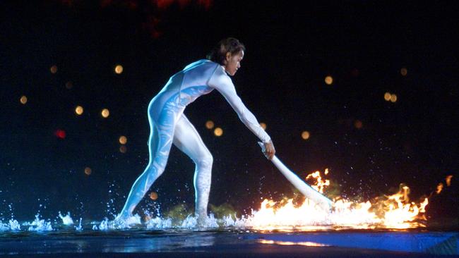 The world was watching as Cathy Freeman lit the cauldron at the 2000 Olympics in Sydney. Picture: AP Photo/Victoria Arocho