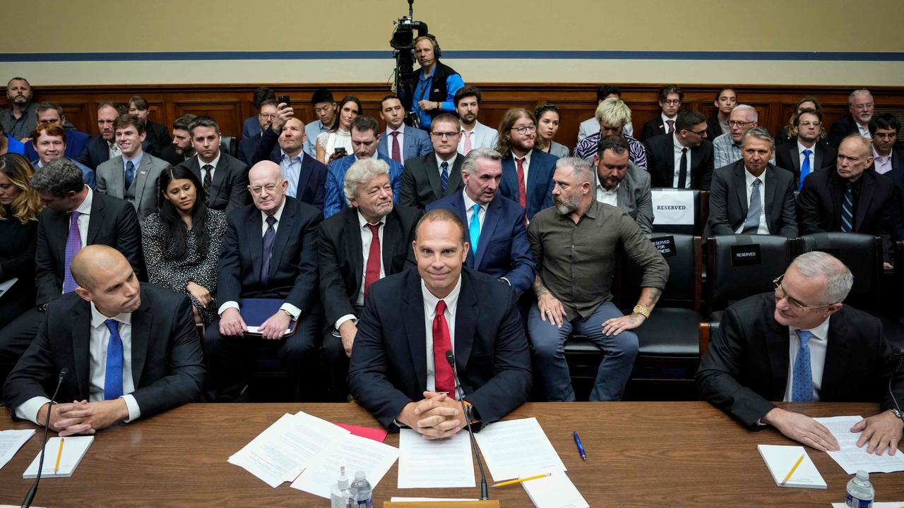 Ryan Graves, David Grusch and David Fravor. Picture: Drew Angerer/Getty Images/AFP