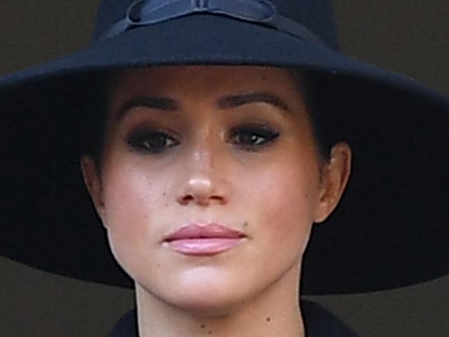 (FILES)  Britain's Meghan, Duchess of Sussex looks on from a balcony as she attends the Remembrance Sunday ceremony at the Cenotaph on Whitehall in central London, on November 10, 2019. - Remembrance Sunday is an annual commemoration held on the closest Sunday to Armistice Day, November 11, the anniversary of the end of the First World War and services across Commonwealth countries remember servicemen and women who have fallen in the line of duty since WWI. (Photo by Daniel LEAL-OLIVAS / AFP)