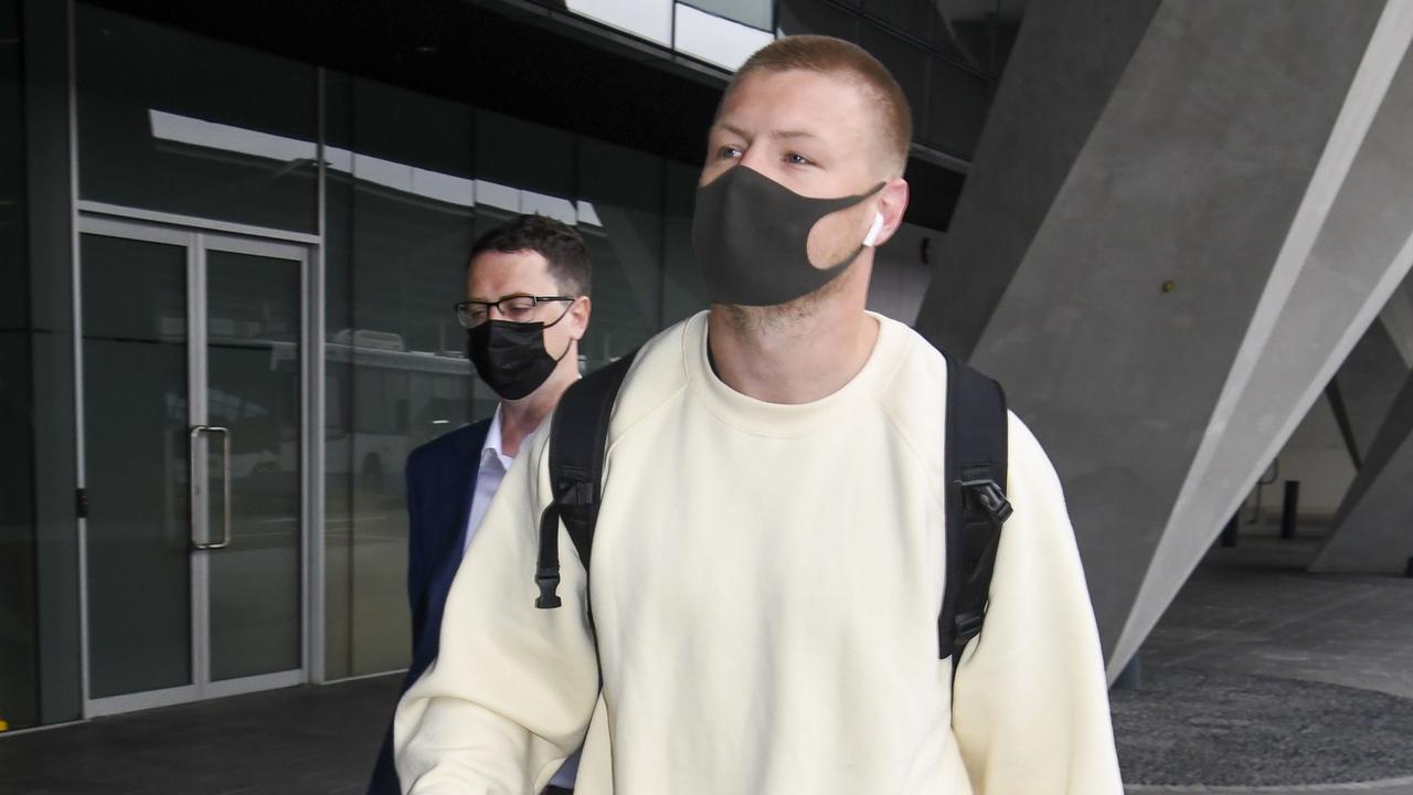 Collingwood star Jordan de Goey arrives back in Australia.