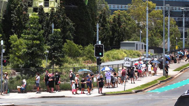 Huge queues snake around the block form the Gold Coast University Hospital COVID testing clinic. Picture Glenn Hampson