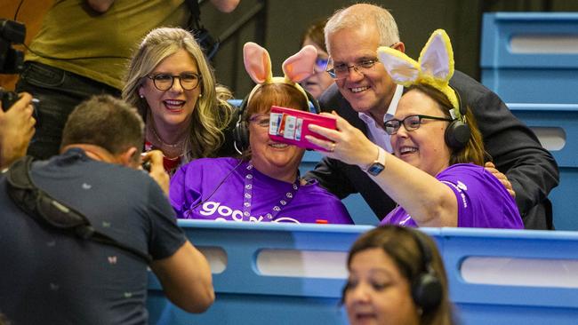 Volunteers get a selfie with Prime Minister Scott Morrison and Good Friday Appeal chairman Penny Fowler. Picture: Aaron Francis