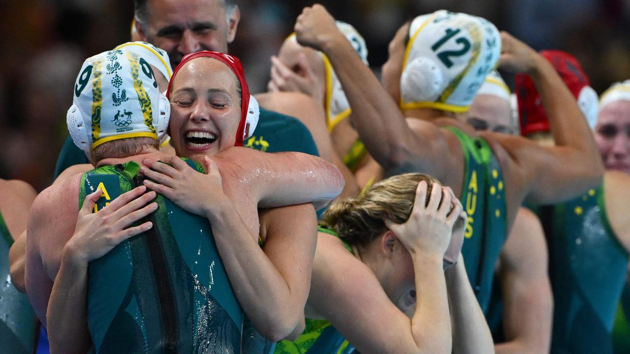 Australian's players celebrate after winning in the women's water polo semi-final match between Australia and USA at the Paris La Defense Arena in Paris on August 8. Picture: Andreas Solaro/AFP