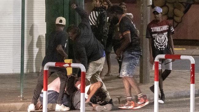 Violence erupts the outside a pizza shop in Alice Springs at the weekend when police were forced to draw their Tasers. Picture: Liam Mendes